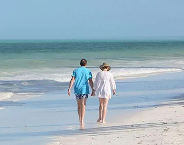 Beach Walking along the coast of Indian Ocean near Baraza Resort & Spa