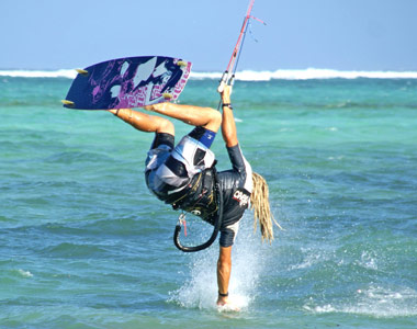 Kite Surfing across the waves of water in Zanzibar