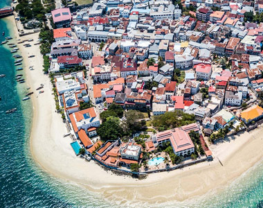 Aerial view of Stone Town, Zanzibar with historic buildings and coastline